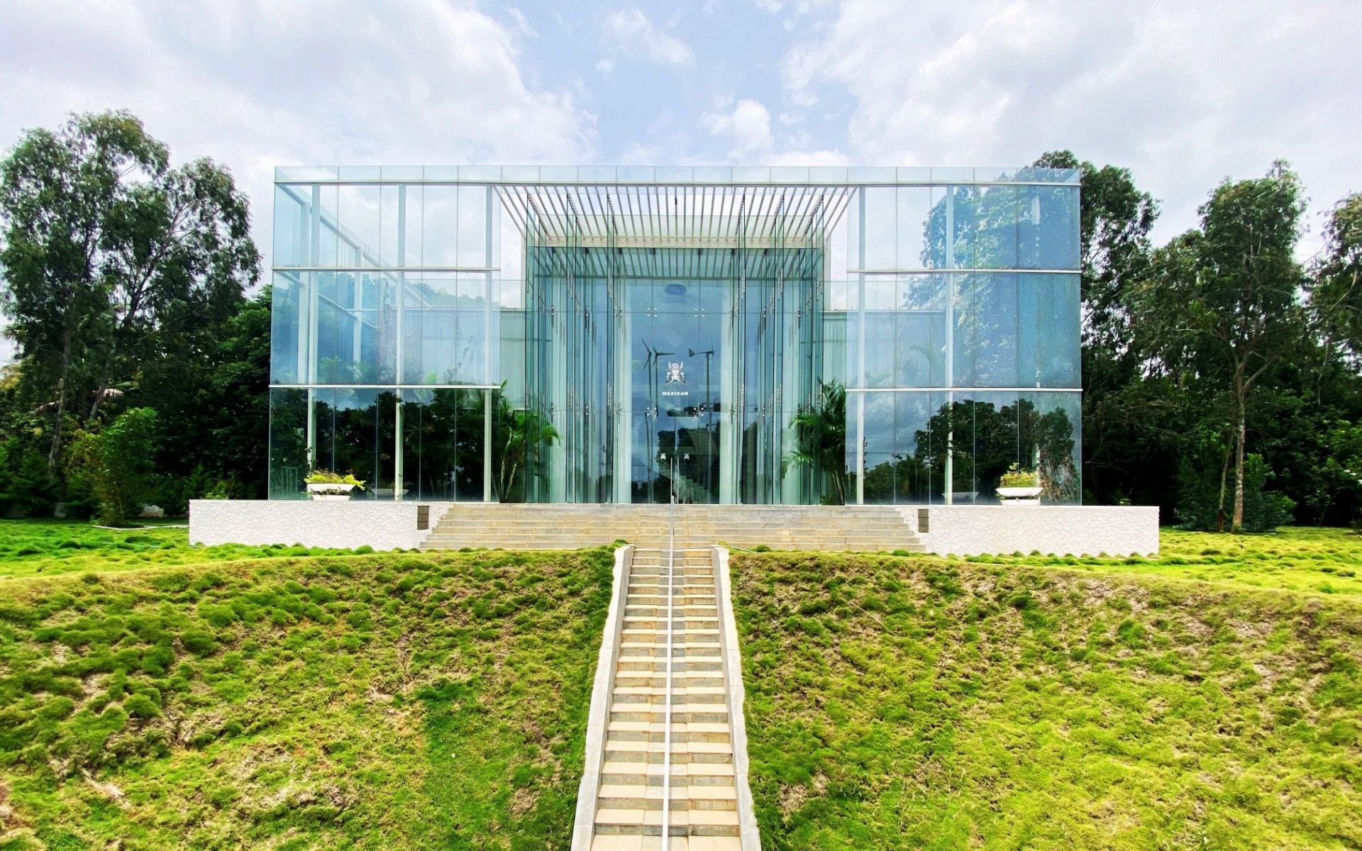 Bengaluru’s Crystal Hall Is A High Performance Sustainable Glass House Rooted In Nature