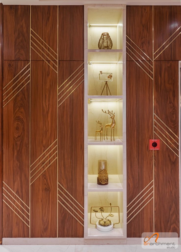 Brass inlays make this feature wall pop!