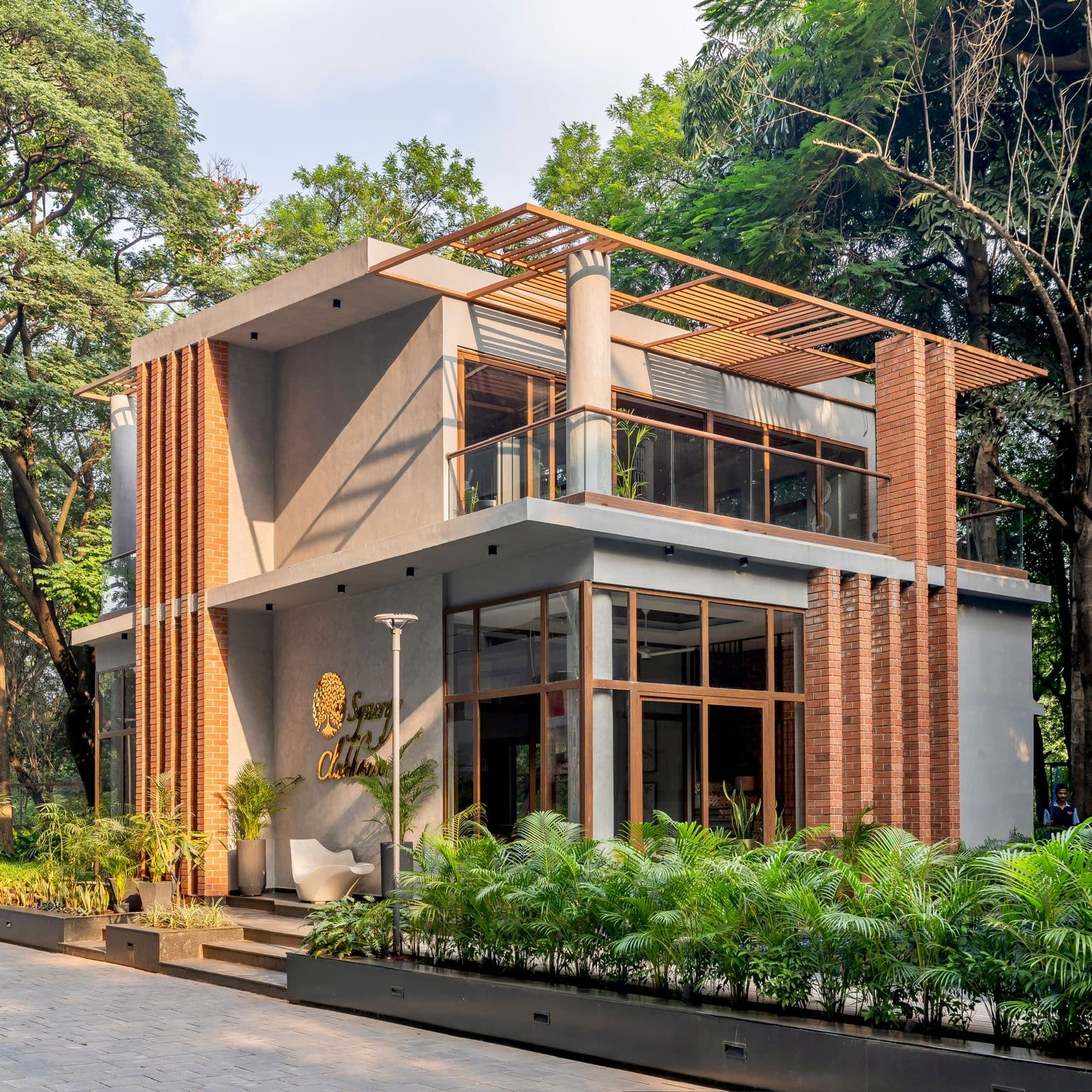 Hop in and out the green door at Pune's earthy clubhouse - Architect ...